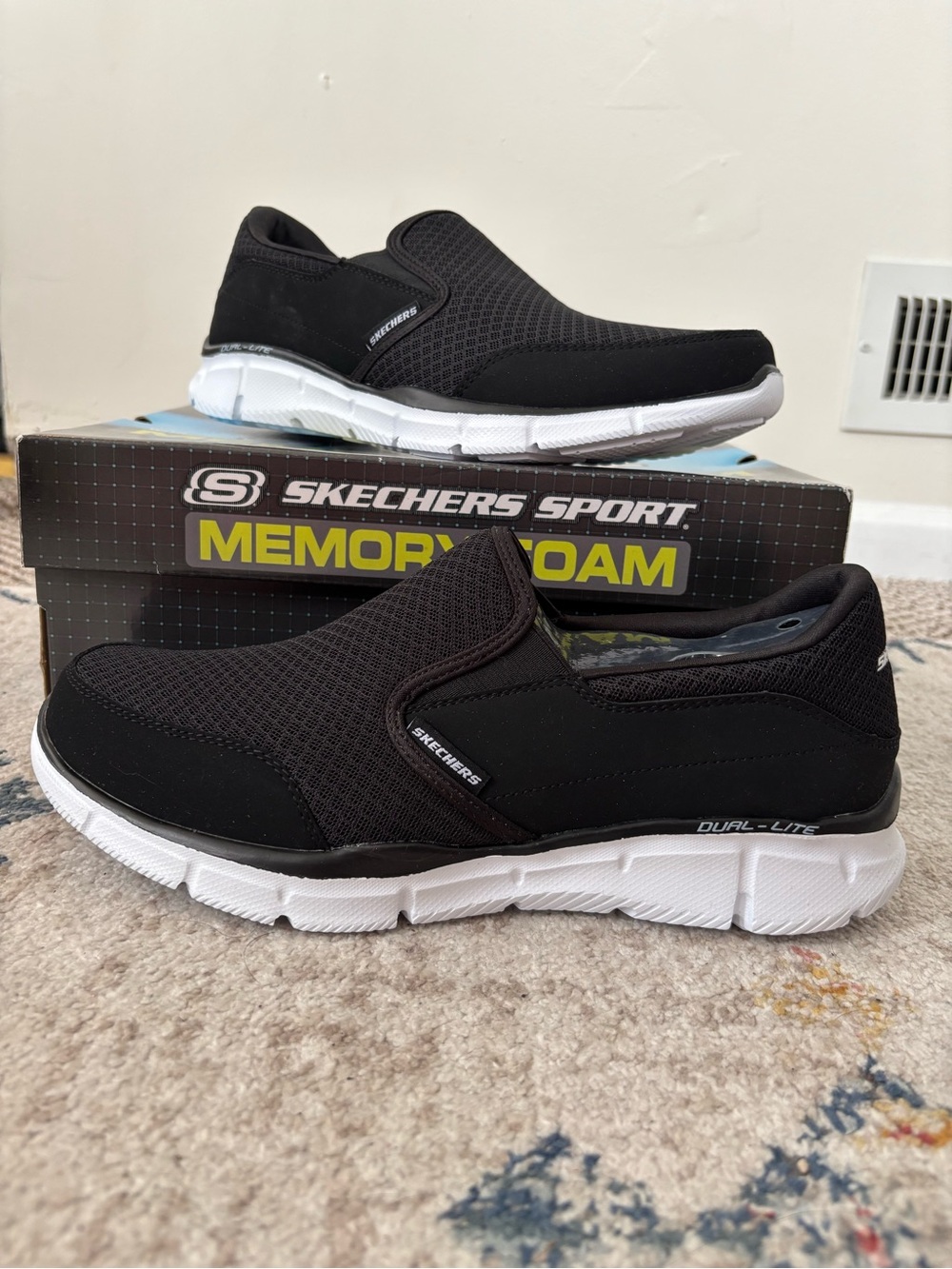 Skechers Black Slip-On Casual Loafers with White Sole
